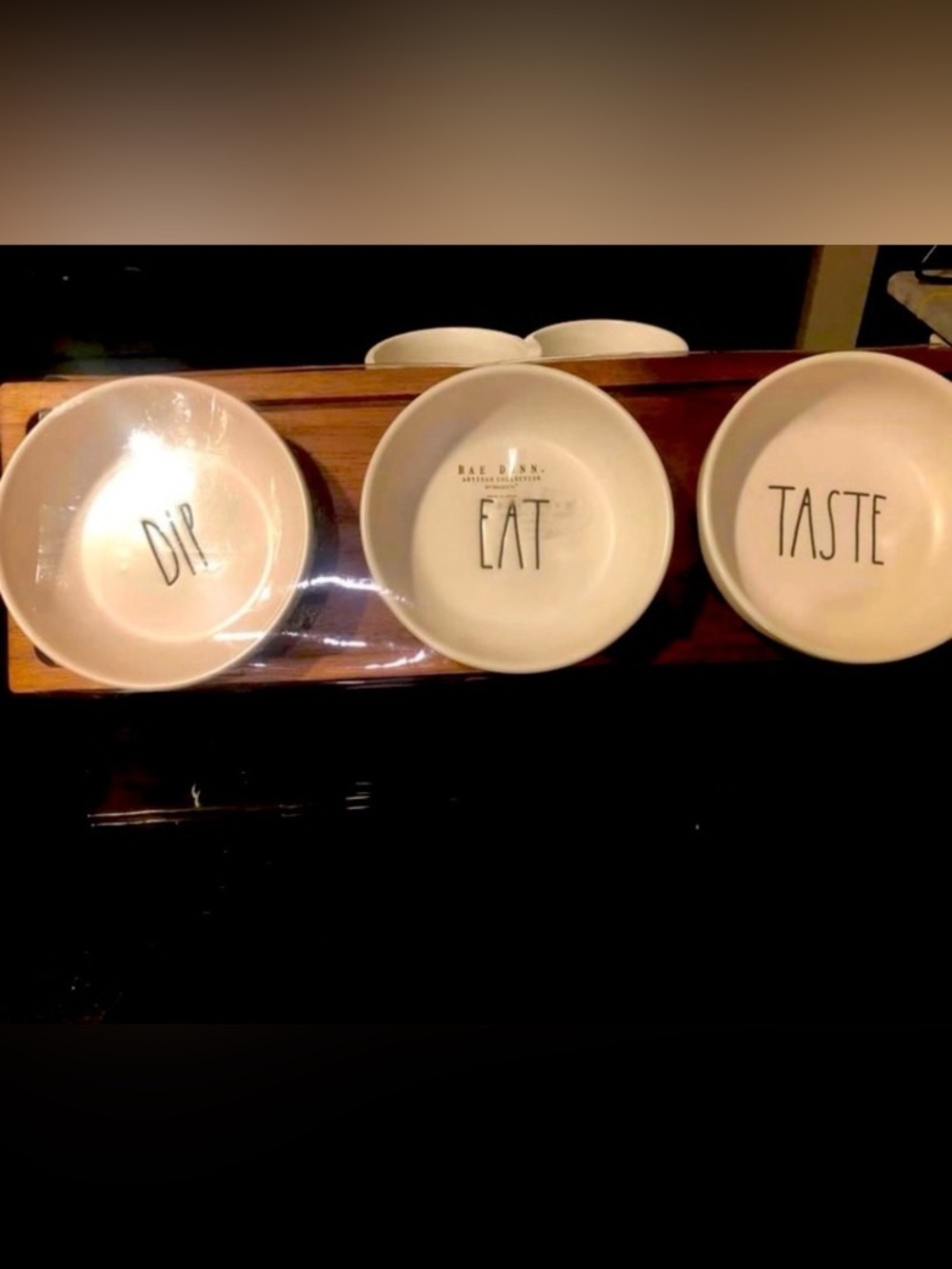 Rae Dunn Eat, Dip, Taste bowls with wooden holder.